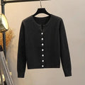 Cable-Knit Round Neck Sweater